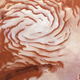 A mosaic image produced with the High Resolution Stereo Camera on the Mars Express spacecraft, which shows spiral features used to interpret ice advancement and retreat at Mars’ north pole. Image: ESA/DLR/FU-Berlin/Ralf Jaumann.